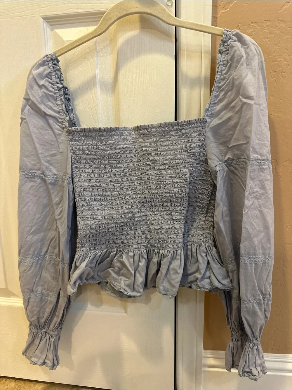 Reformation Roland Smocked Top in Mineral Blue